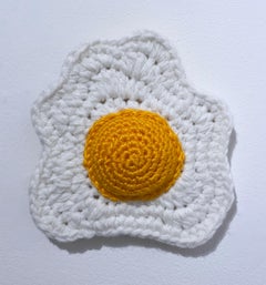 Dippy Egg No. 2 (2022) by Lace In The Moon, pop art textile crochet sculpture