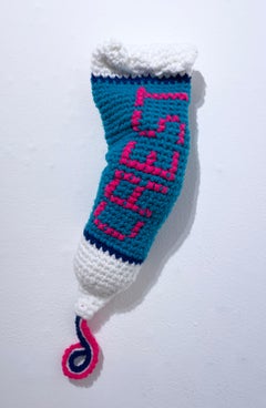 Toothpaste (2022) by Lace In The Moon, pop art textile crochet wall sculpture