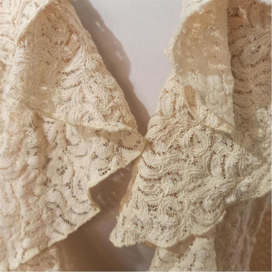Wool Lace Beige color With rouches Lenght from shoulder cm 50 (236 inches) Shoulder cm 38 (196 inches) Fabric tag missing
