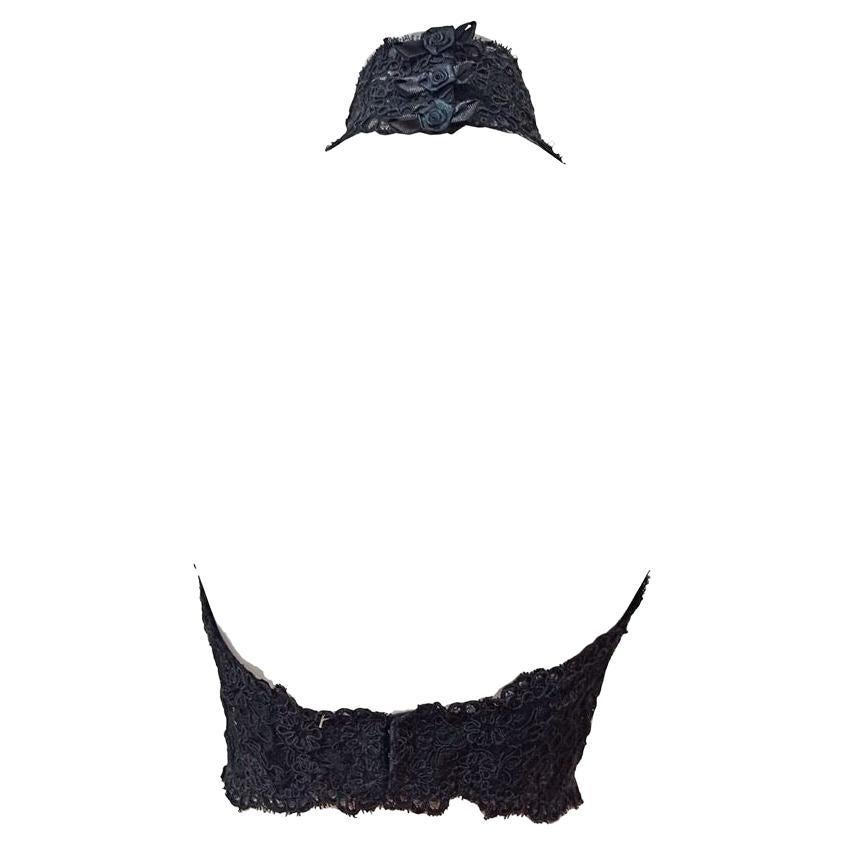 Nylon and polyester Black color Macramè lace Neck and back hooks closure With preformed cups inside Total length cm 41 (1614 inches)
