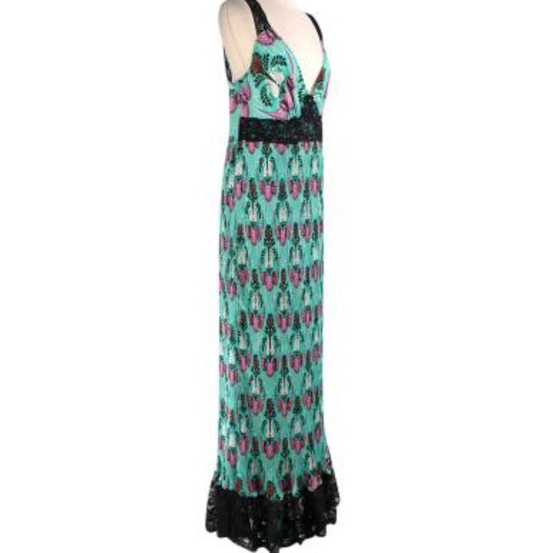 Paco Rabanne lace-trimmed green floral plisse maxi dress
 
 
 
 -Printed in florals and trimmed in black lace
 
 -Plunging neckline
 
 -Zipped back, hook-fastening back
 
 -Pleated body 
 
 -Light-weight, non stretch 
 
 -Maxi length
 
 
 
