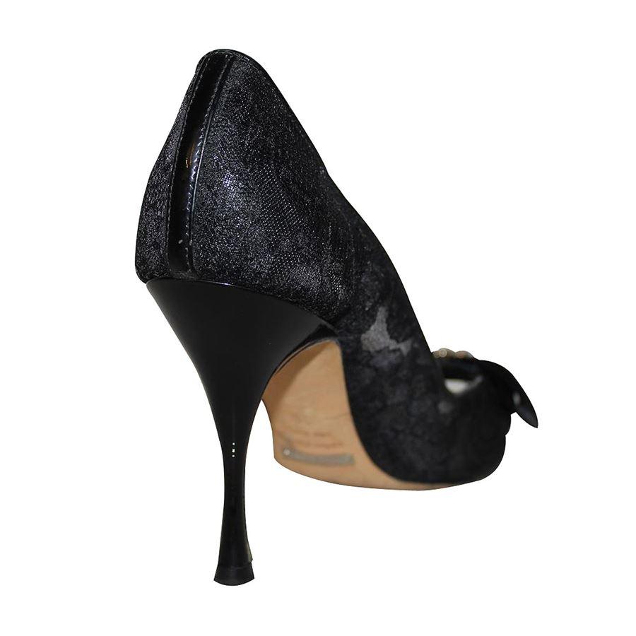 Lace Black color Satin bow with crystals detail Heel height cm 9.5 (3.74 inches) With dustbag Presence of little signs on the patent heels see pictures
