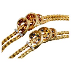 Lacloche Frères Paire de bracelets en rubis et saphir avec attache pour collier