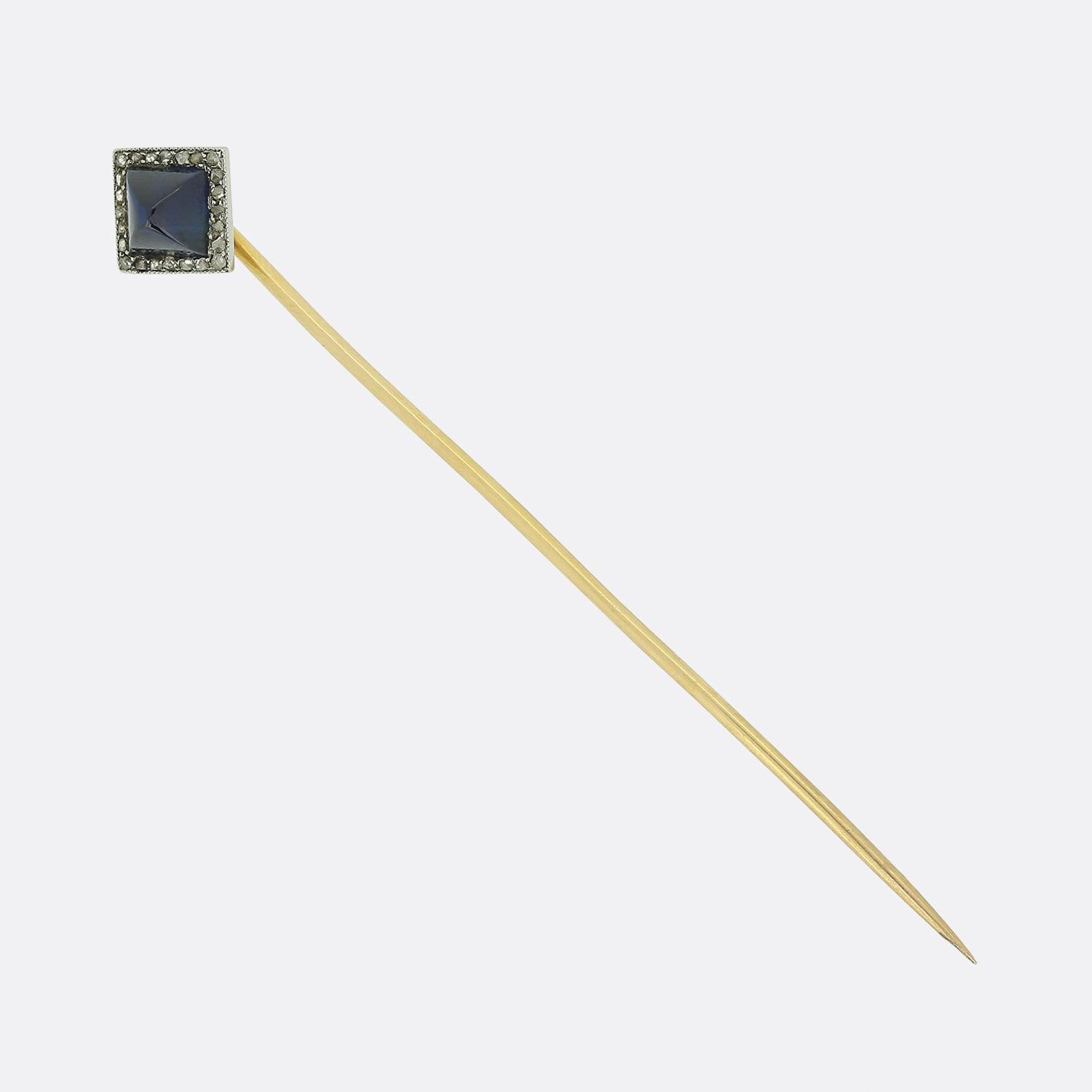 Here we have a simple yet elegant stick pink from the renowned Spanish jewellery house of Lacloche Frères. This piece has been crafted from a warm 18ct yellow gold with the head being set with fabulous sugarloaf sapphire. The term sugarloaf means