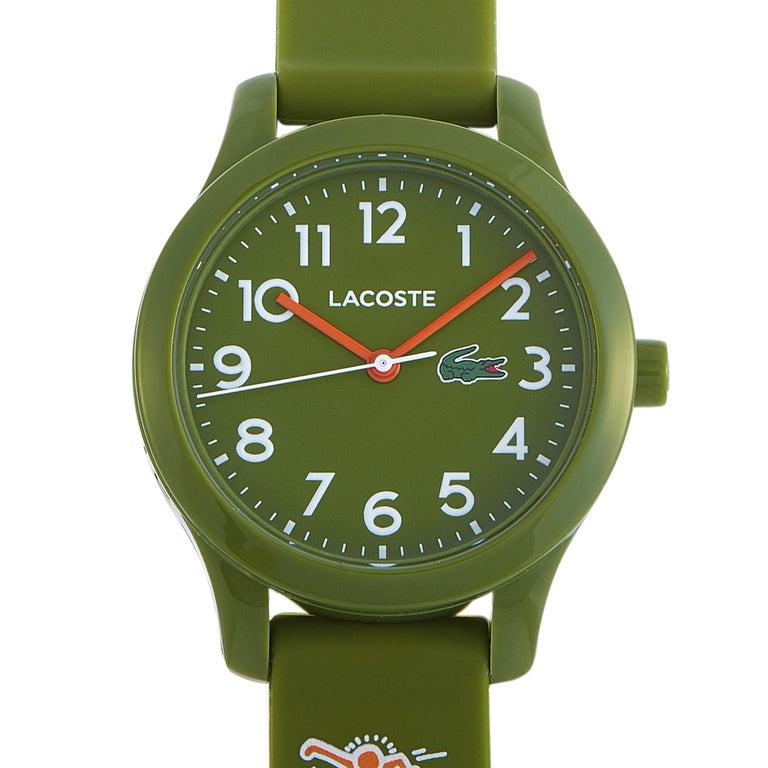 This is the Lacoste Keith Haring Foundation boyâ€™s watch, reference number 2030015. It is presented with a 32 mm green plastic case that boasts stainless steel back. Powered by a quartz movement, this model indicates hours, minutes and seconds on