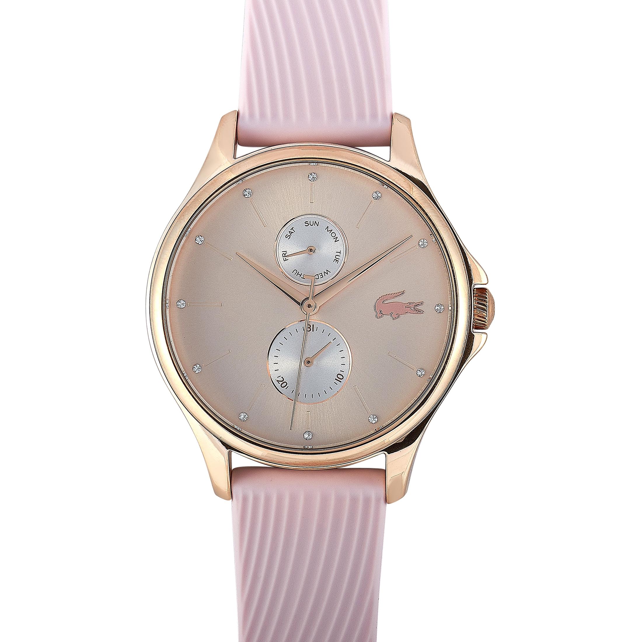 This is the Lacoste Kea watch, reference number 2001025.
 
 It is presented with a rose gold-tone stainless steel case that measures 38 mm in diameter. The case is water-resistant to 30 meters and mounted onto a light pink silicone strap, secured