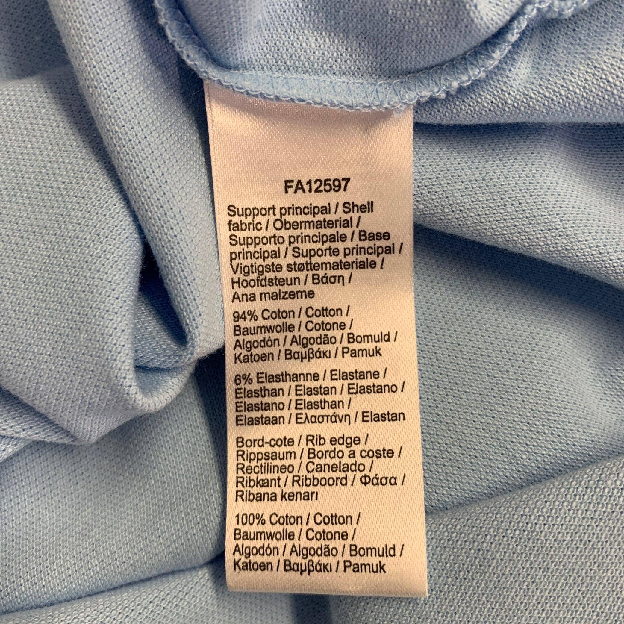 Polo LACOSTE taille S avec broderie bleue en coton mélangé en vente 2
