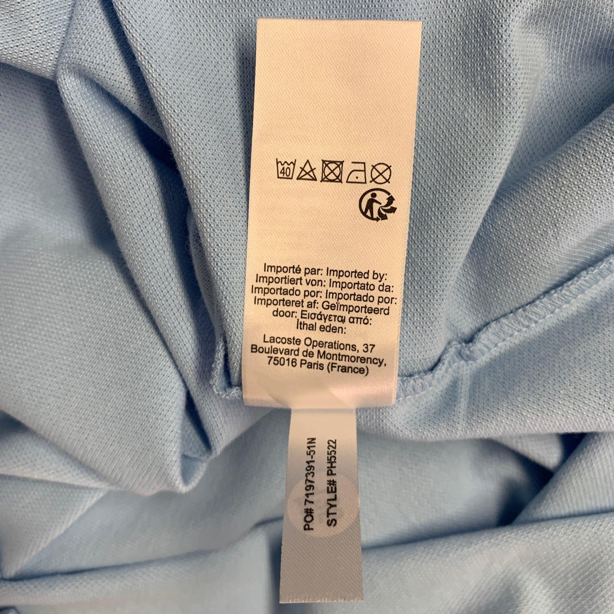 Polo LACOSTE taille S avec broderie bleue en coton mélangé en vente 3