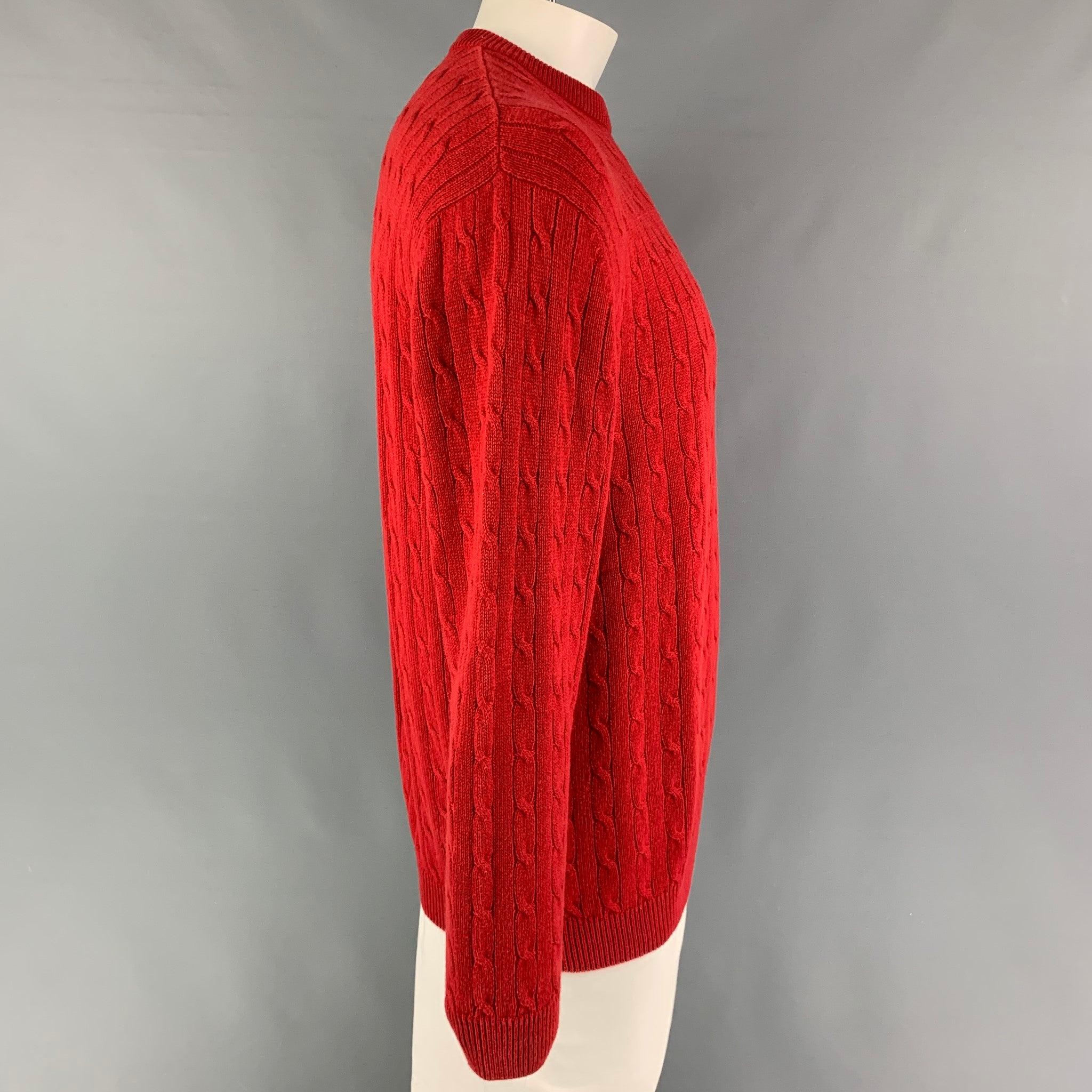 LACOSTE sweater comes in a red cable knit cotton / wool featuring a embroidered logo and a crew-neck.
Very Good
Pre-Owned Condition. 

Marked:   S 

Measurements: 
 
Shoulder: 22 inches  Chest: 48 inches  Sleeve: 26 inches  Length: 28 inches 
  
  
