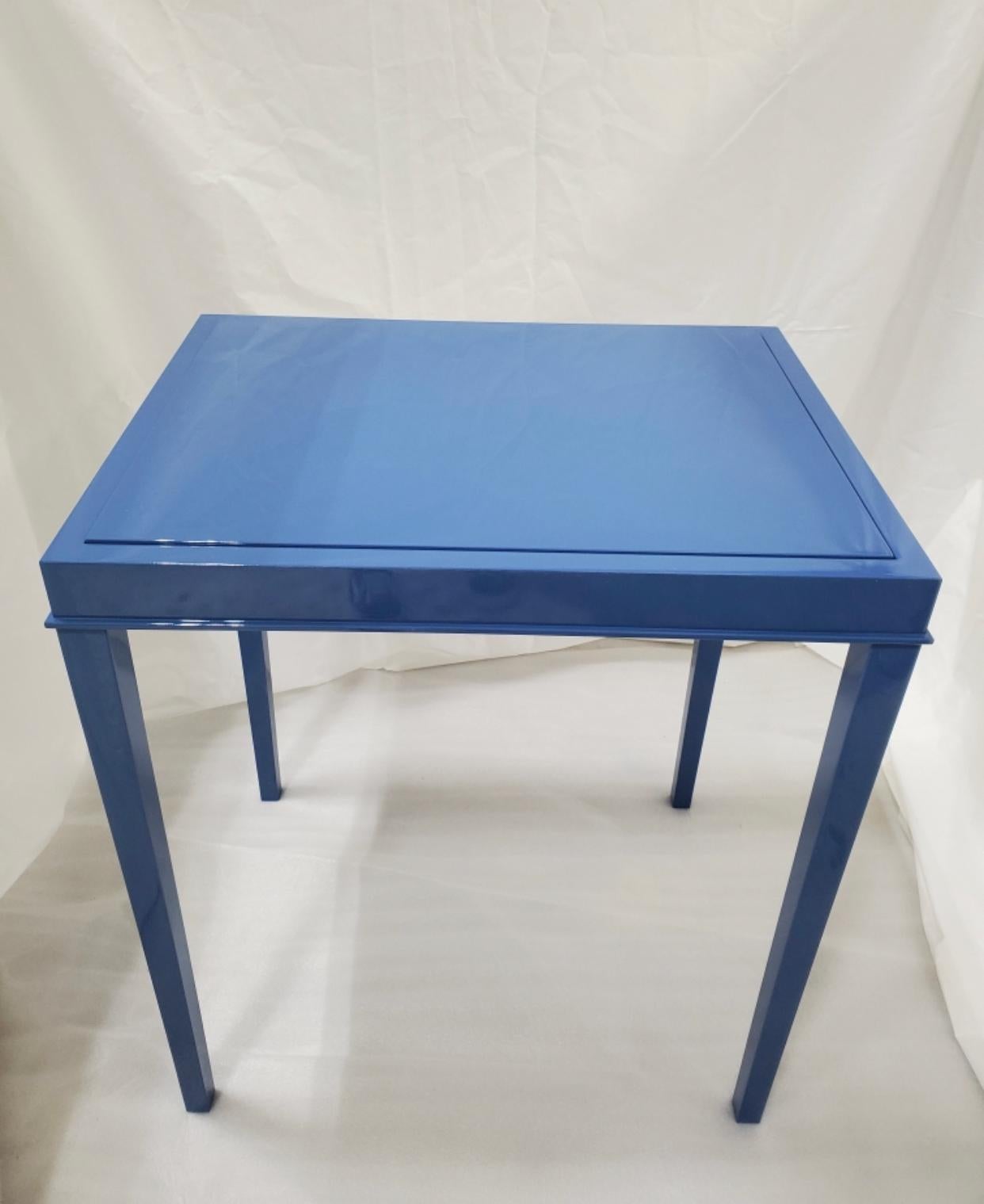 Lacquer blue table that coverts to a backgammon game table.
New production. Designed and made in NYC, each table is handcrafted within NYC and has unique attributes. One-day delivery available in NYC.
 
 