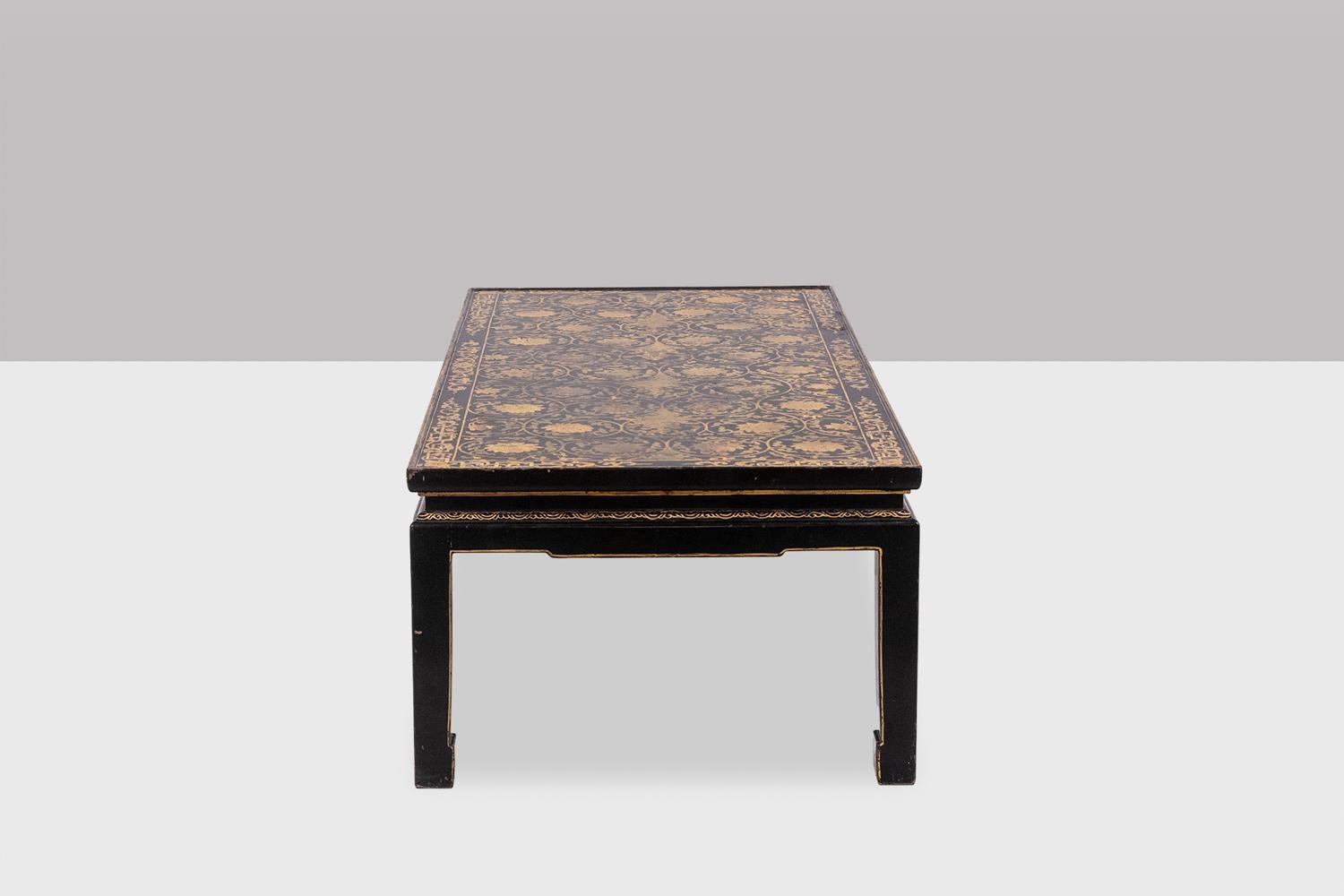 French Lacquer coffee table enhanced with floral motifs. Circa 1900. For Sale