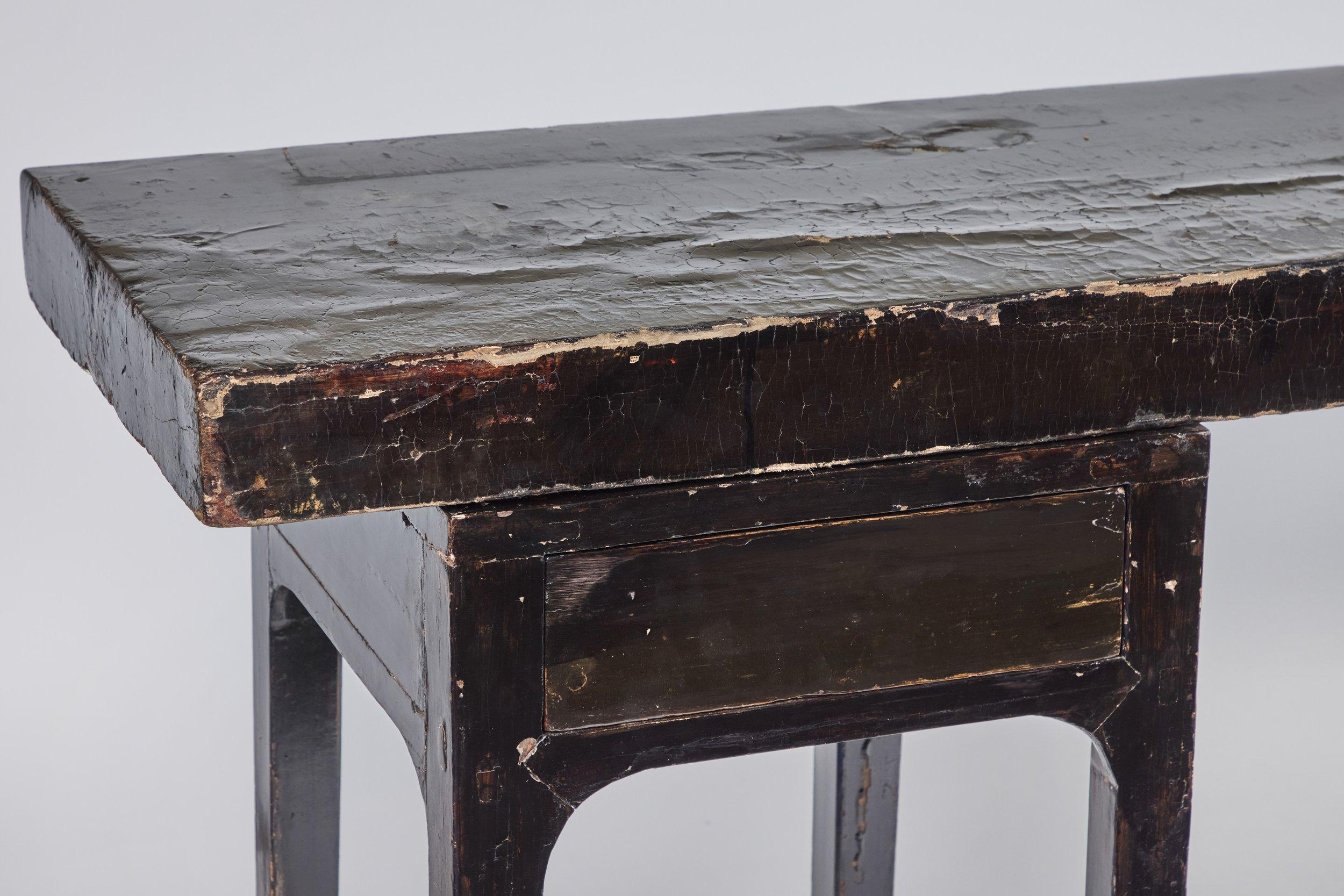Black lacquer console table with two drawers. Measures 108