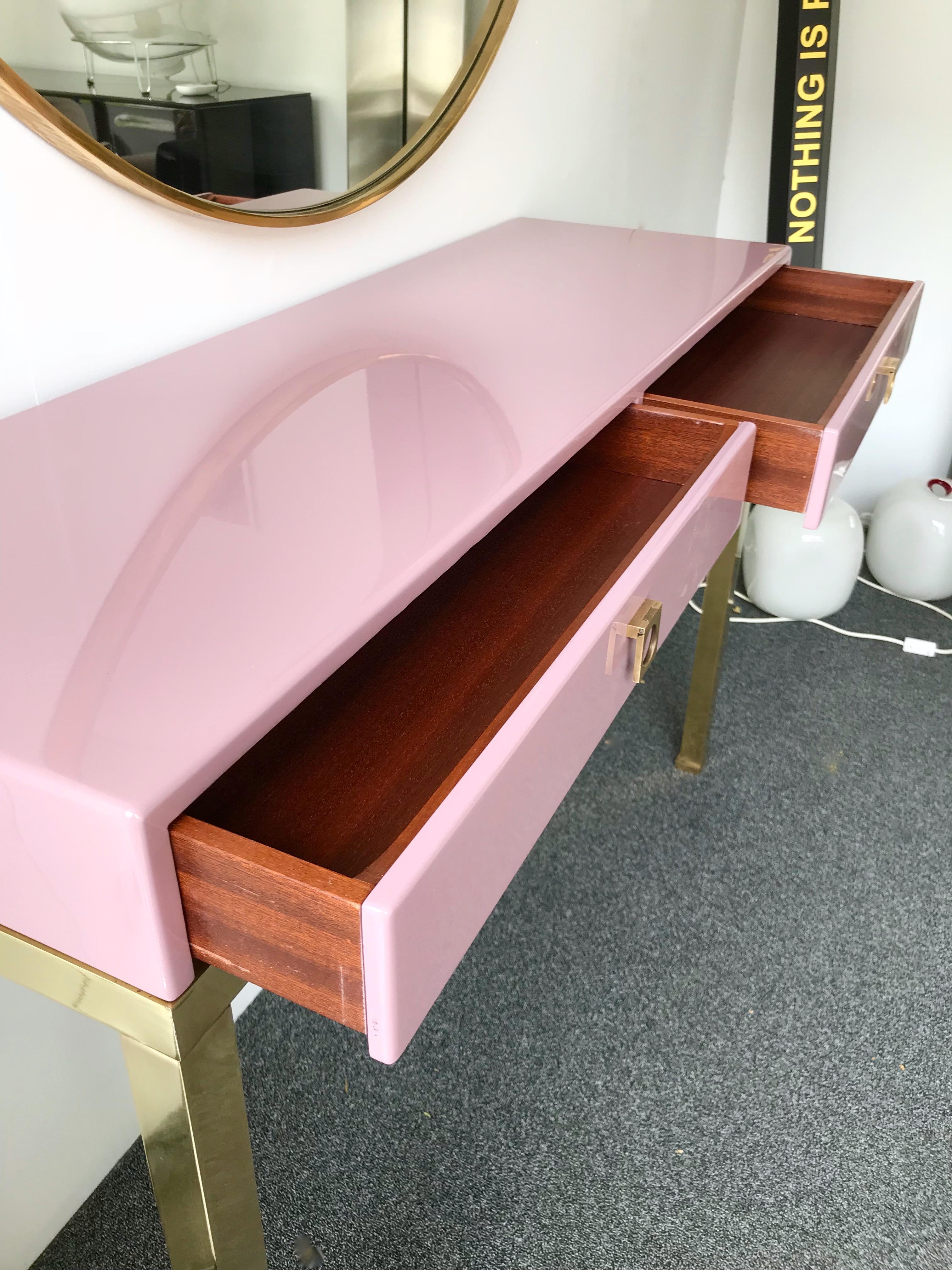 Console table in light purple or pink parma lacquered wood, brass feet, interior drawers in wood by the french designer Guy Lefèvre for Maison Jansen. 