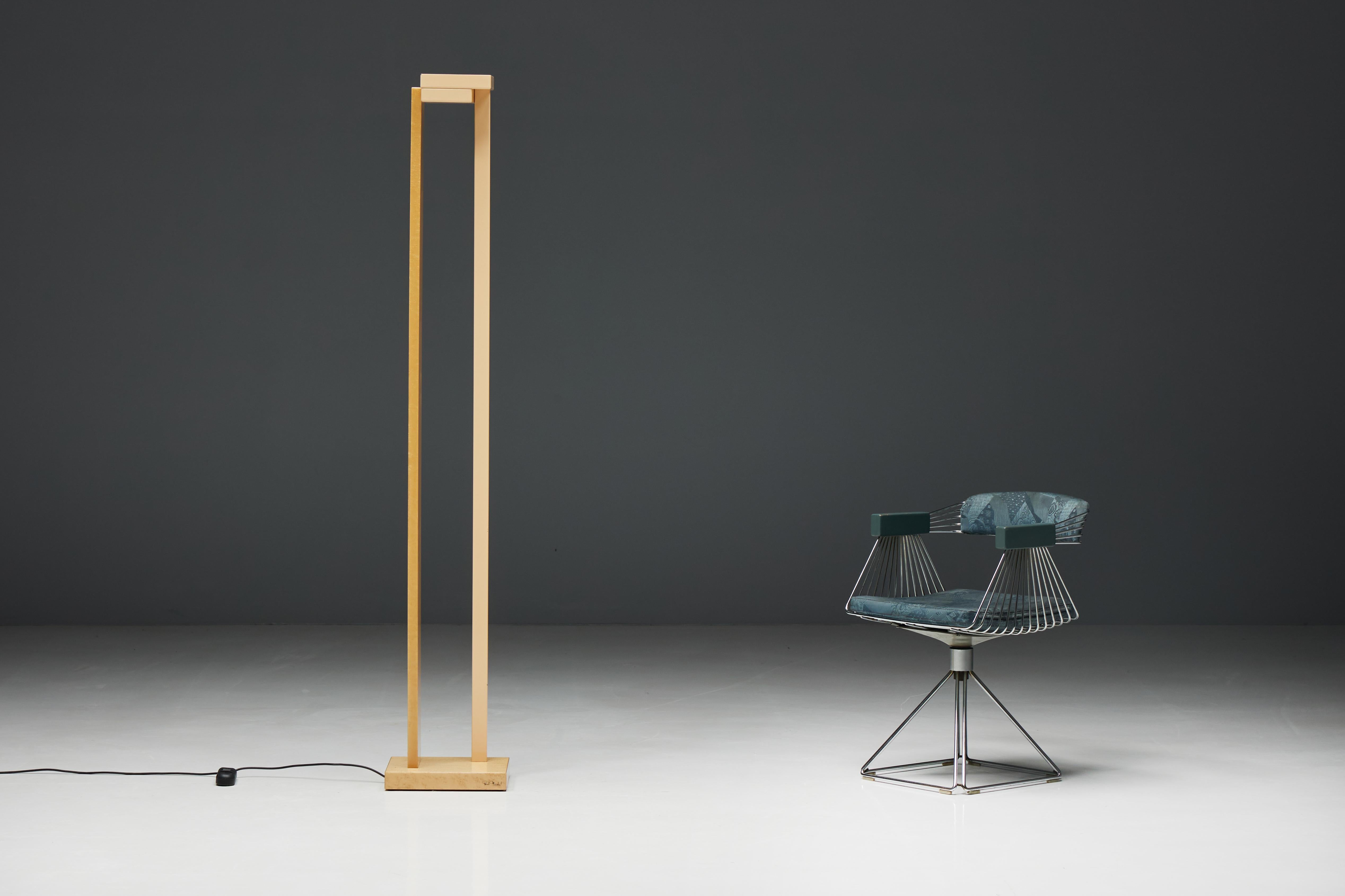 Two-tone tall floor lamp by Paul Michel, crafted with birds eye maple veneer and cream lacquer. Michel's design philosophy is rooted in the art of minimalism, where every element serves a purpose. This lamp is a testament to that ethos, with its