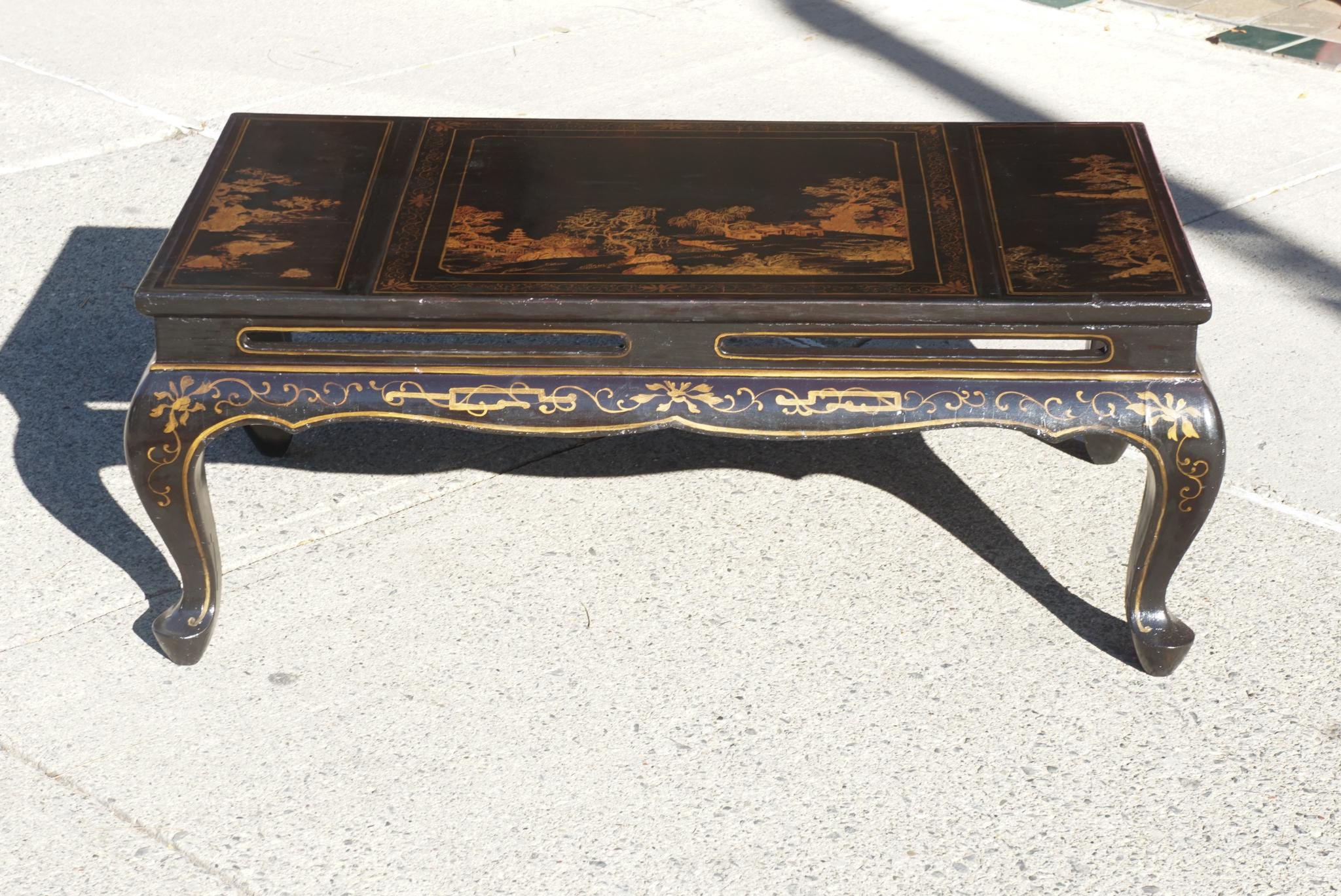 This fine early 20th century lacquered chinoiserie coffee table was made in France, between 1920 and 1940. Produced to accommodate the large demand for chic sophisticated furniture of a growing class of elite consumers, the table is made to imitate