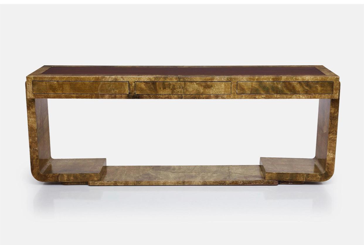 A stunning, large-scale, lacquered goatskin and mahogany console by Enrique Garcel for Jimeco, 1980s. Very similar to designs by Jean Michel Frank, Karl Springer and Aldo Tura. With its unique blend of materials and textures, this large and