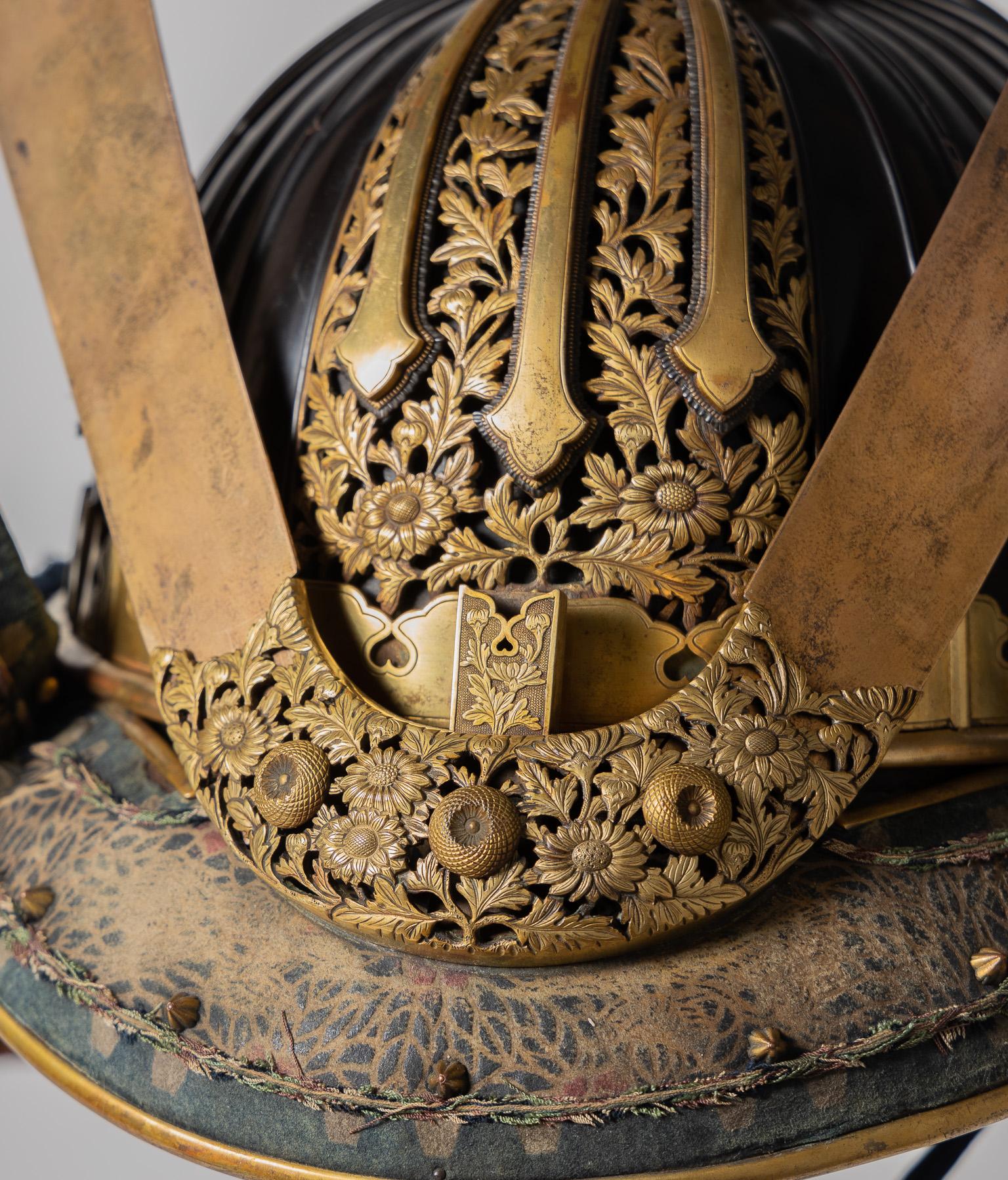 Nerikawa kabuto
Lacquered leather samurai helmet 

Late Edo period 

Signed: Tsuda Kiyotake kore o sei (??????) and dated 1861 

 

The helmet designs popular during the Muromachi period made a strong comeback in the second half of the Edo