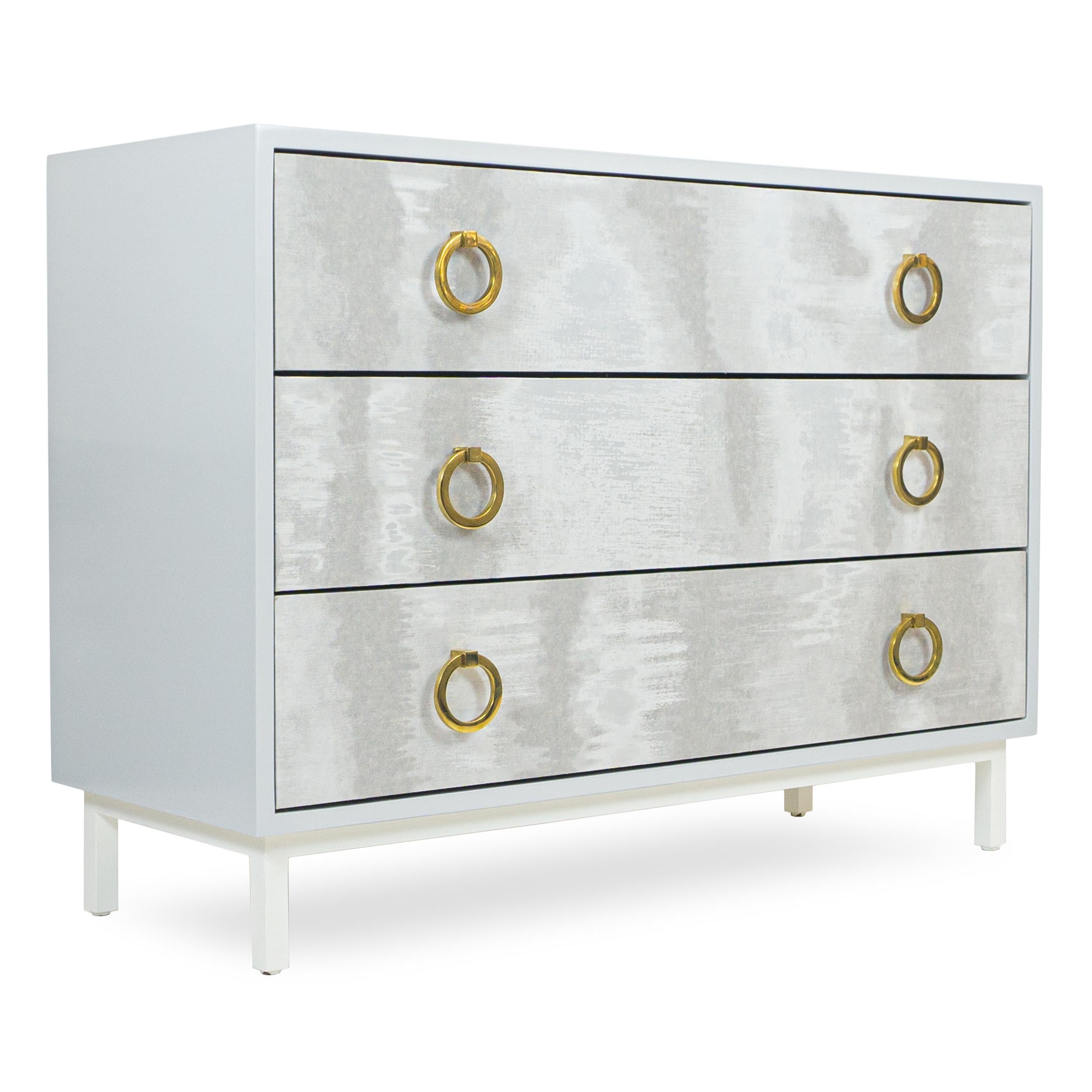 light blue dresser with gold hardware