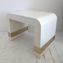 Lacquered linen waterfall side or coffee table with gold metal bands, USA 1980s