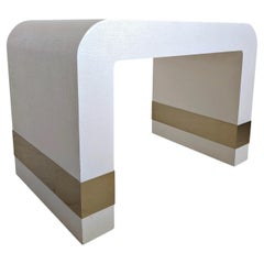 Lacquered linen waterfall side or coffee table with gold metal bands, USA 1980s