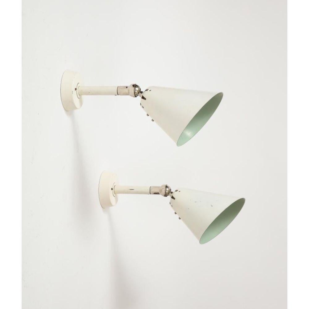 Two available, priced individually. 

Lacquered Metal and Chrome Wall Sconce, Sweden, c. 1960

Brutal, modern looking wall sconces, reminiscent of midcentury Finnish, Swedish, and German design. Beautiful patina to the lacquered steel.

Additional