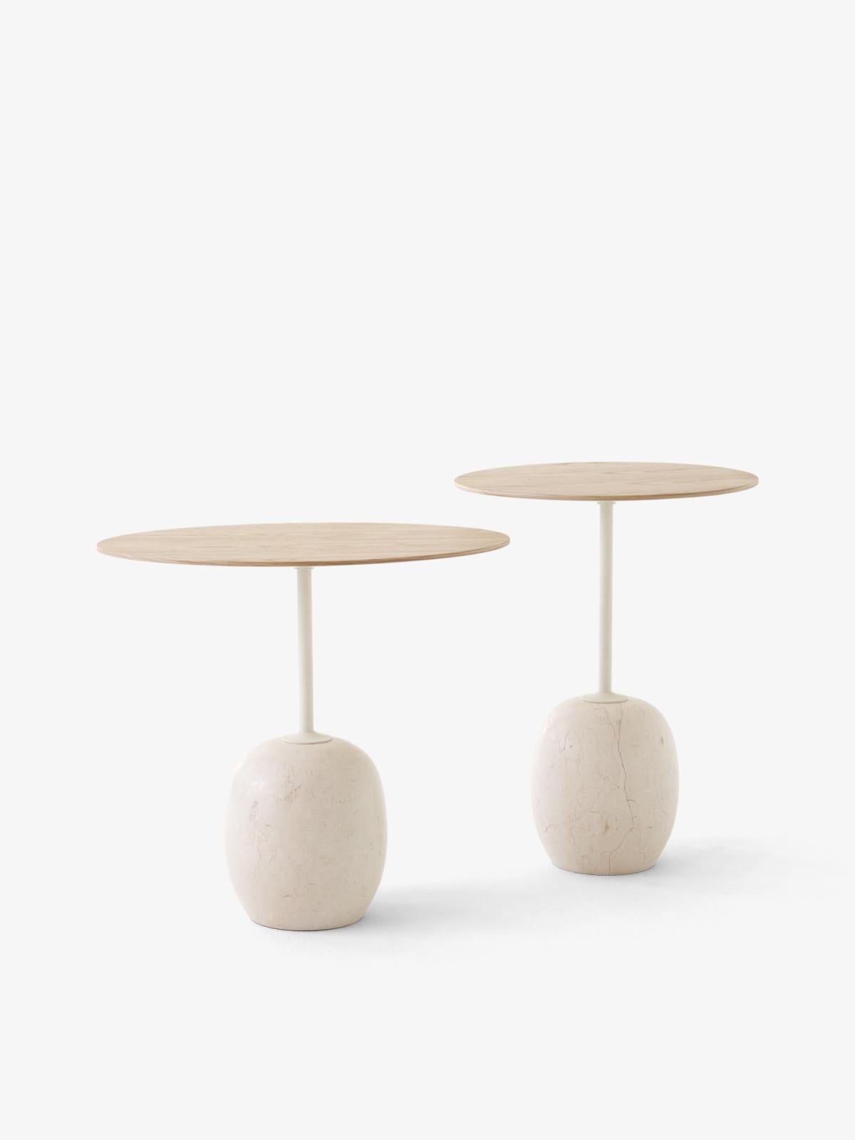At first glance, Lato resembles a sculpture, with its slim, oval table top balanced by an oval-shaped base. 
The marble is turned into shape on a lathe and then honed to a semi Matt finish. 
Striking, graphic and poetic, its purity of form is