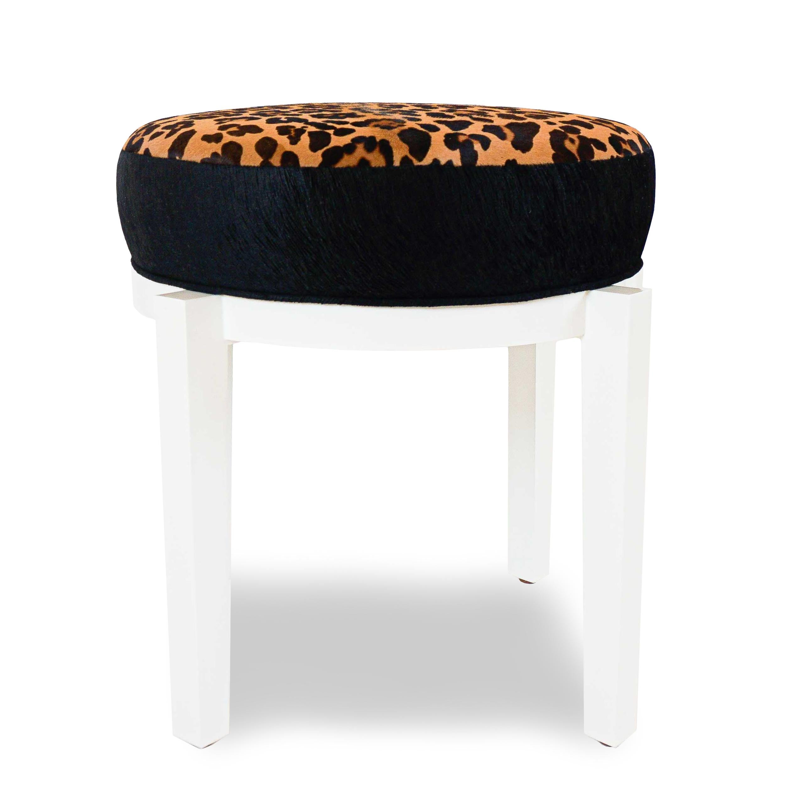 About this piece
Sold as a pair (or we can do custom orders of just 1), this ottoman set is solid hard maple frame lacquered high gloss white. The upholstery is a mixture of leopard printed calfskin and embossed black velvet. For occasional seating,