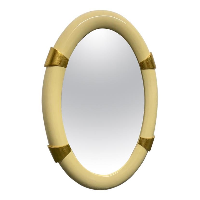 Lacquered Oval Mirror with Gold Leaf Accents