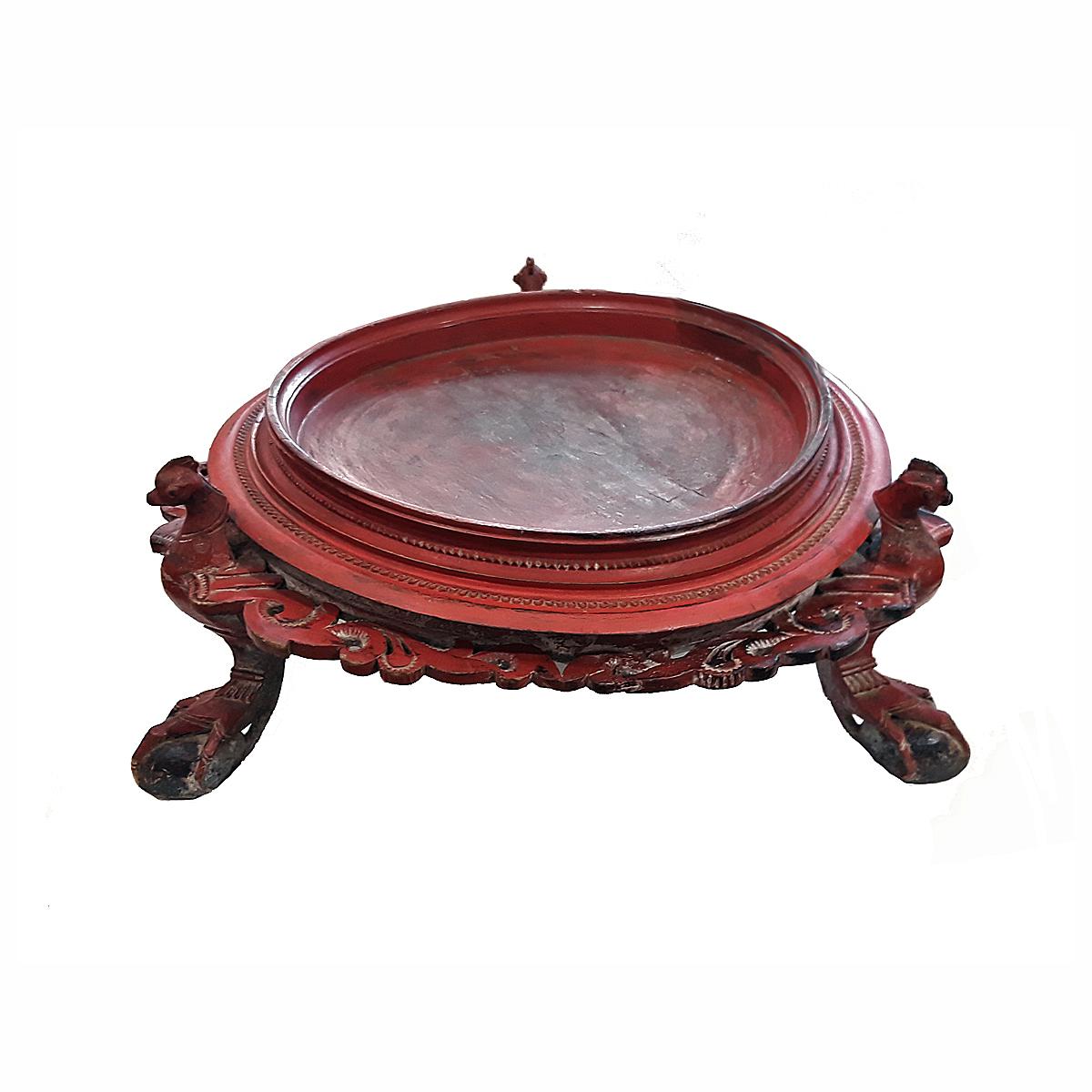 A small pedestal tray table, hand-carved in Burma (Myanmar), circa 1890. 
Red lacquer, hand-carved accents, ball-and-claw feet. A beautiful decorative accent for any dinner table, console, kitchen counter.