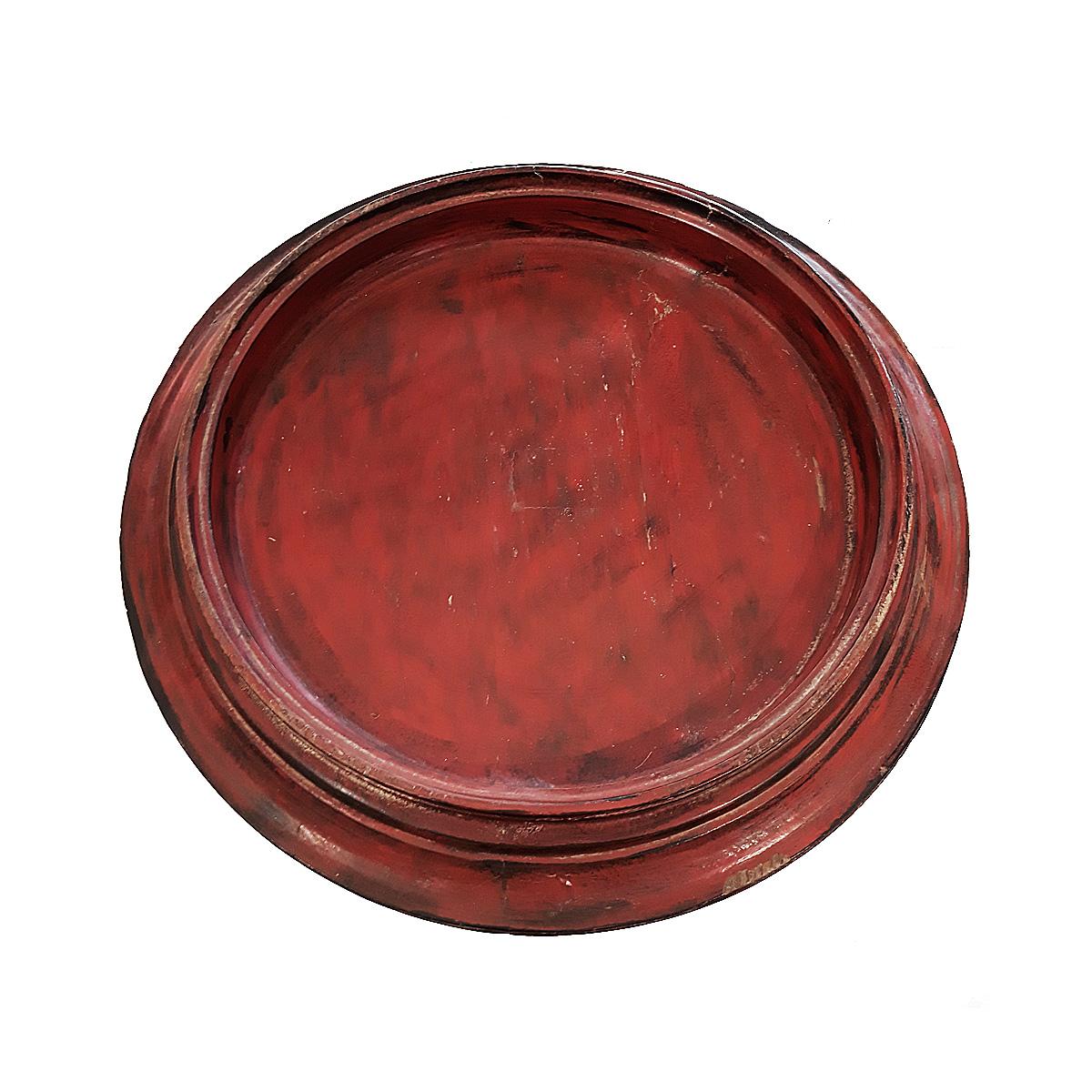 A small pedestal tray table, hand-carved in Burma (Myanmar), circa 1890. 
Lacquered in red, turned base. A beautiful decorative accent for any dinner table, console or kitchen counter.