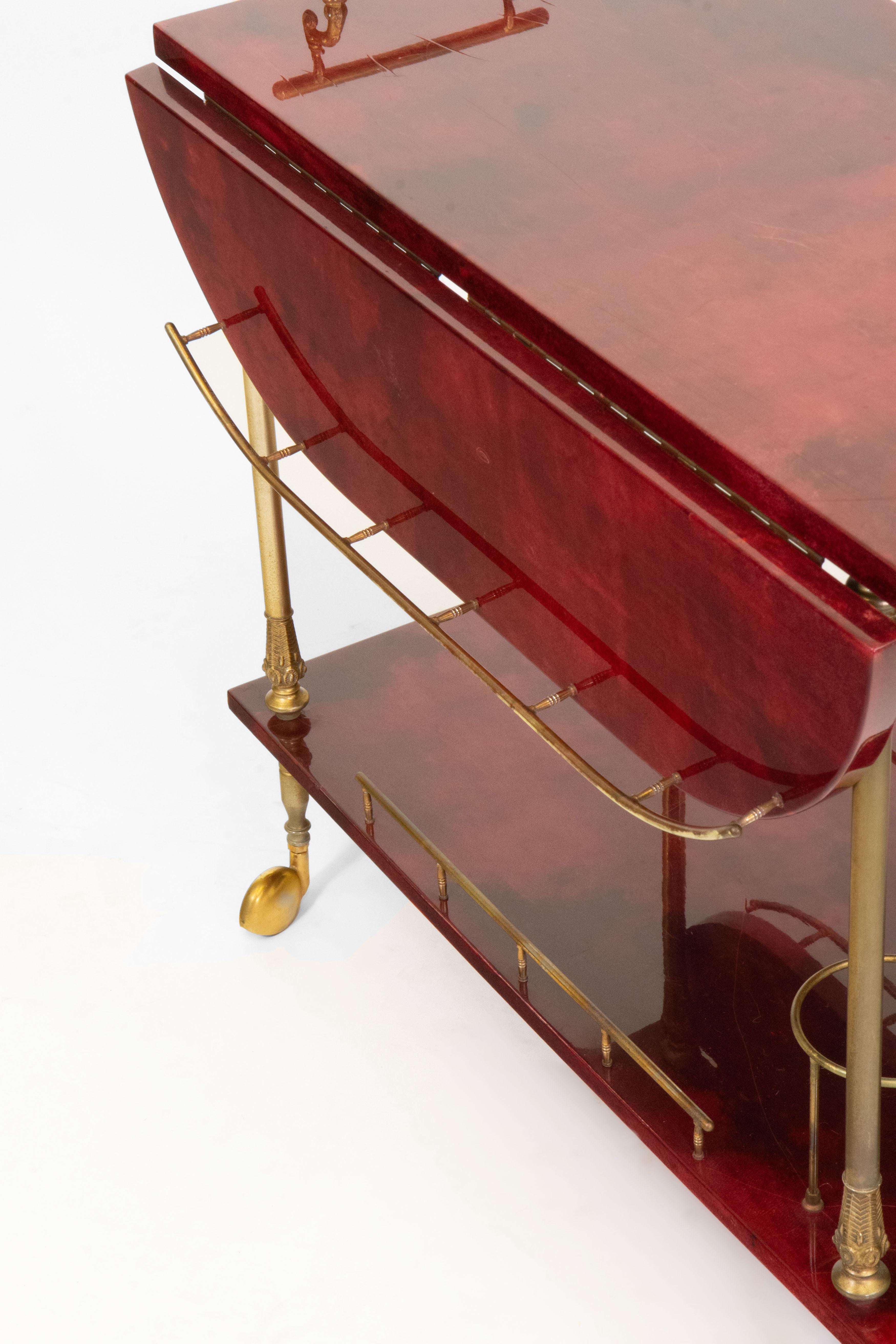 Italian Lacquered Red Parchment Vellum & Gilt Metal Drinks Trolley By Aldo Tura For Sale