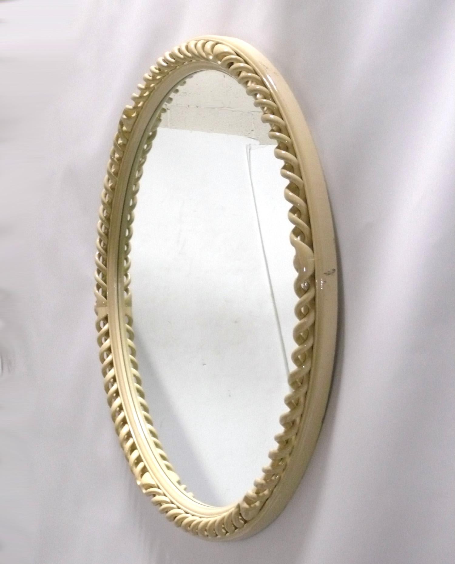 Ivory Color Lacquered Spiral openwork mirror, at least circa 1940s, possibly much earlier. It measures an impressive 41.5