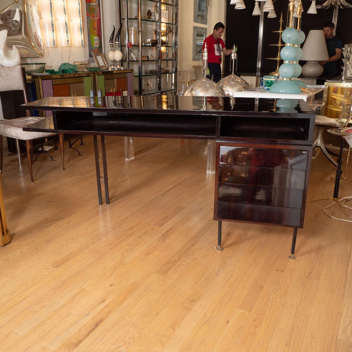 Lacquered wood cantilevered desk.
