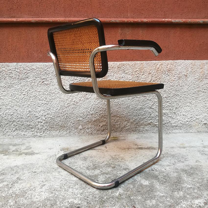 Lacquered wood, metal and Vienna straw chairs in the style of Cesca chair, 1970s
Two chairs produced in Italy following the design of Cesca chair by Gavina, precisely by Marcel Breuer.
This iconic chair is composed by two rush-bottomed pieces on