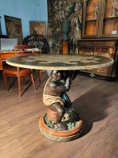 Lacquered wood table, with Venetian blackberry, 19th century