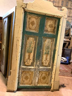 Lacquered wooden door with two doors and painted panels, Italy