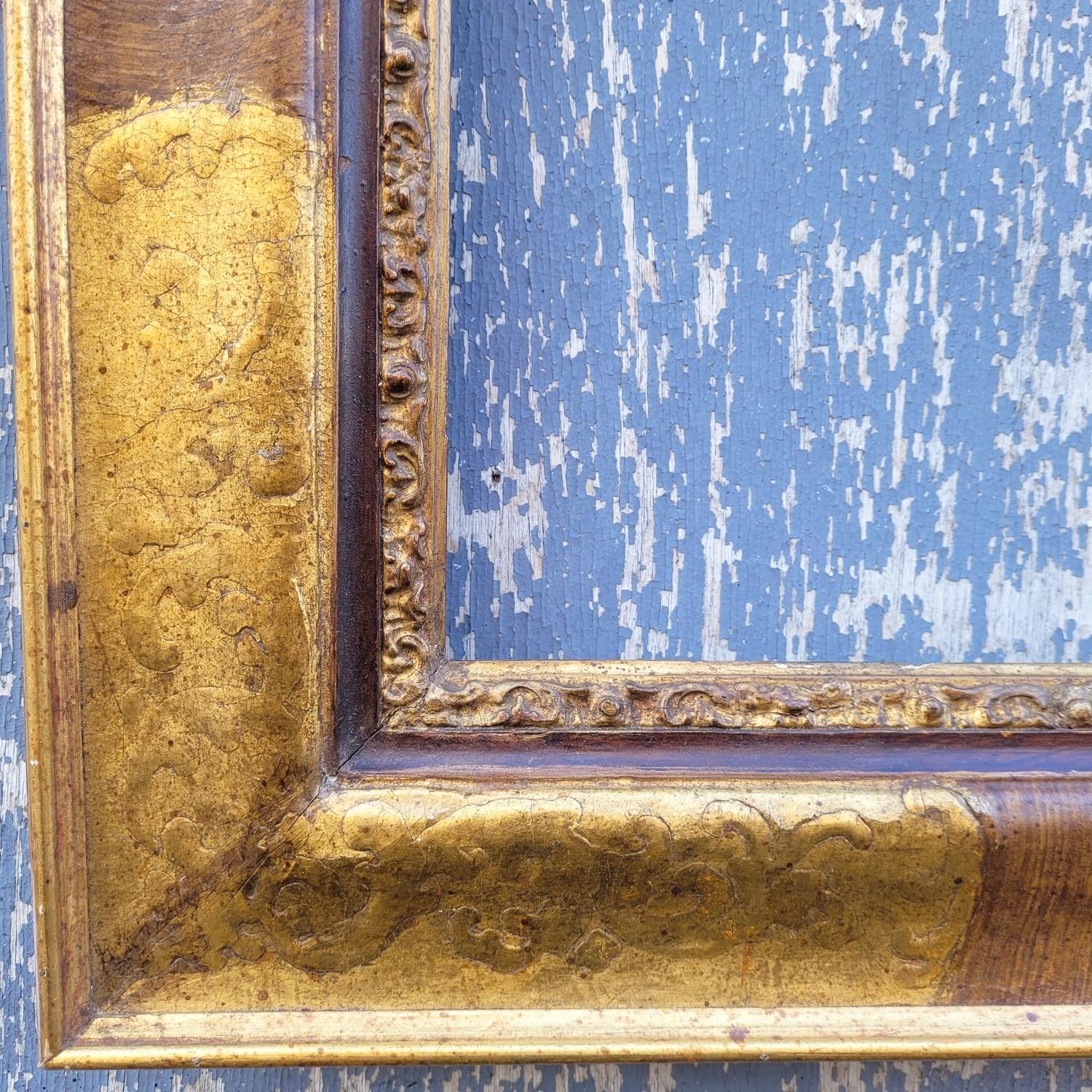 Lacquered, gilded, and marble-effect painted wooden frame in the 17th-century style. 

 Wear and chips consistent with age.  

 Ideal for a mirror (sold as a frame, without mirror)

 Late 19th/early 20th century.  

Frame dimensions: 80 x 98x 5 cm 