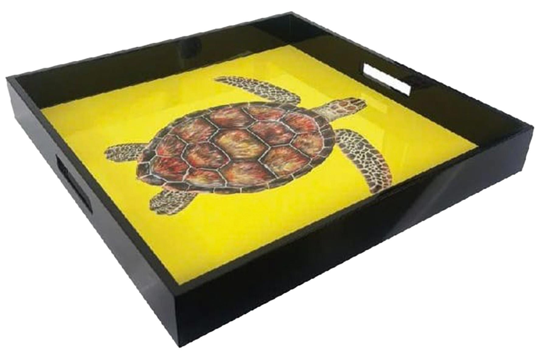 Bold and playful, this lacquered wooden tray features a vibrant yellow background adorned with a turtle motif. Finished with a smooth, glossy surface and practical cut-out handles, it’s perfect for serving drinks, appetisers, or simply as a