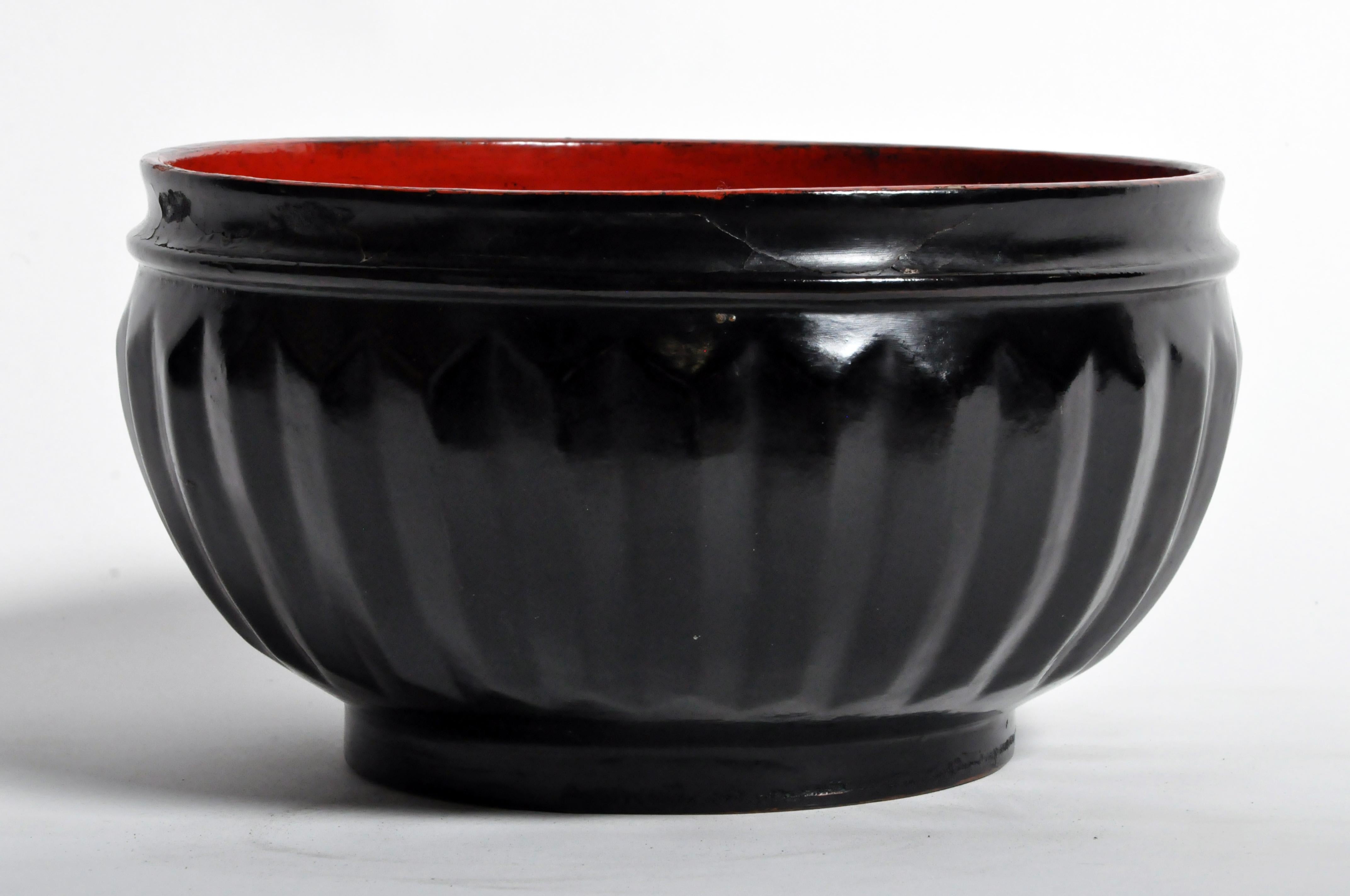 Thailand and Burma are both famous for sturdy and beautiful vessels, platters, and boxes made from lacquered wood and bamboo. Sap from the Laq tree was mixed with iron filings to produce black lacquer and with cinnabar powder to produce red lacquer.