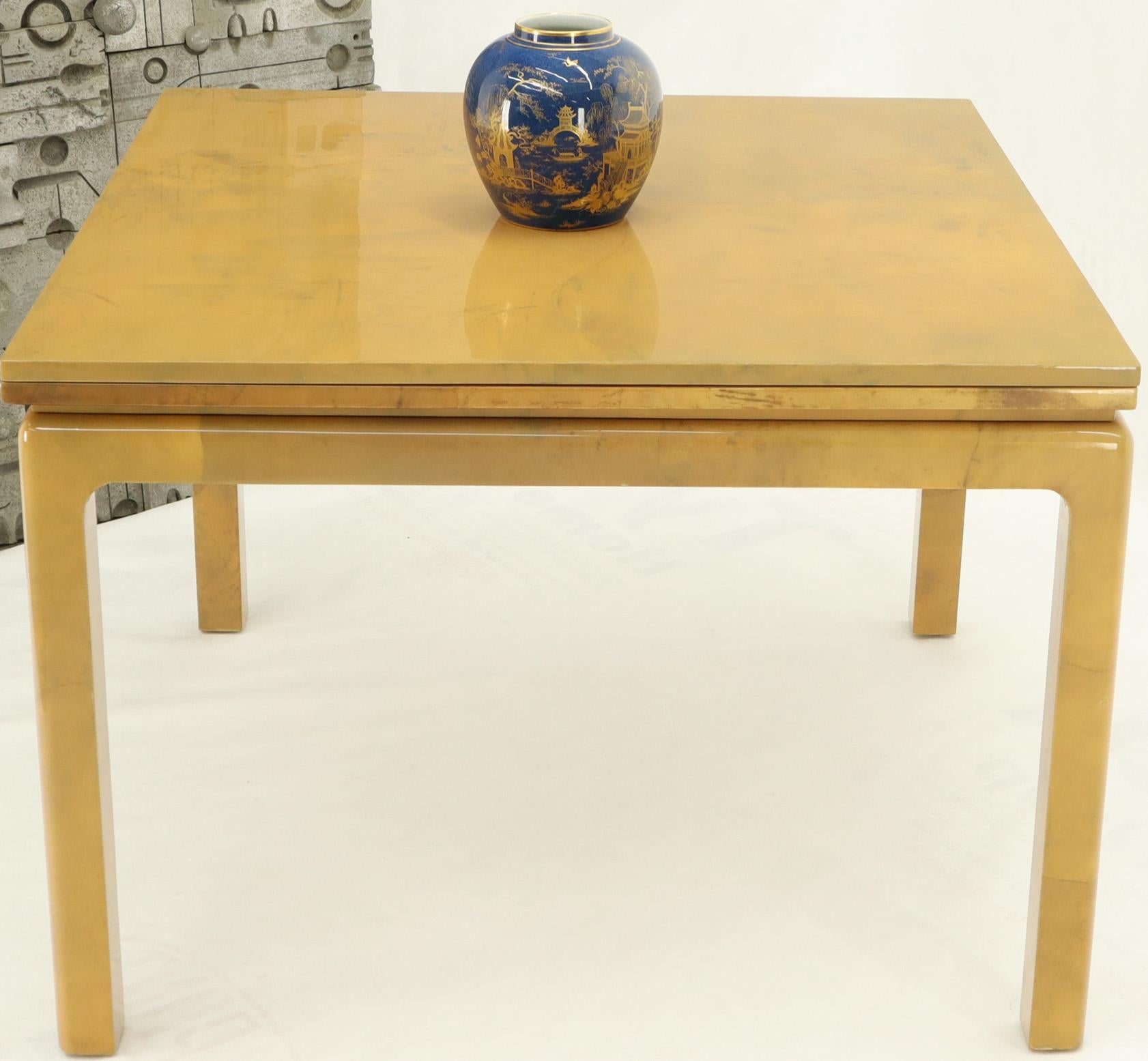 Mid-Century Modern lacquered parchment square convertible expandable dining table. High quality thick lacquer finish over real parchment. In the manner of Karl Springer or Enrique Garcia.