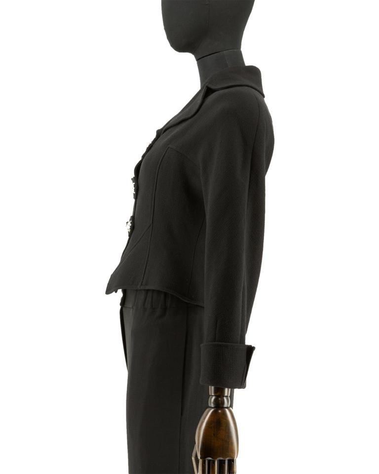 An early 1990's Christian Lacroix Pret a Porter black wool double-crepe panel jacket with black top-stitch detail throughout,  featuring a large stand collar and revers, stylised kimono sleeves with complementing turn-back cuff and slit, front and