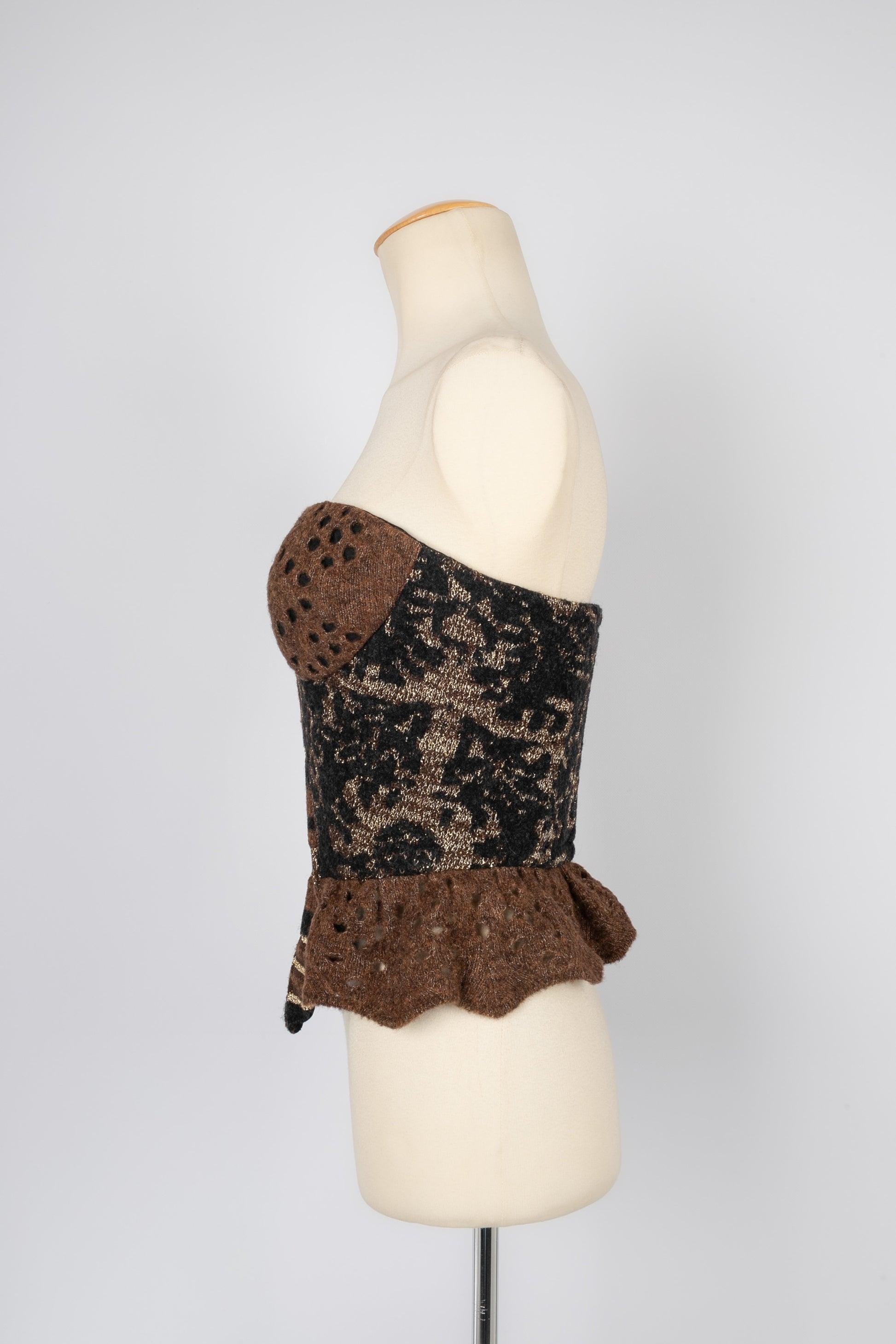 Christian Lacroix - (Made in France) Woolen bustier top. 1993 Fall-Winter Collection. 38FR Size.

Additional information:
Condition: Very good condition
Dimensions: Chest: 41 cm - Length: 35 cm
Period: 20th Century

Seller Reference: FH109