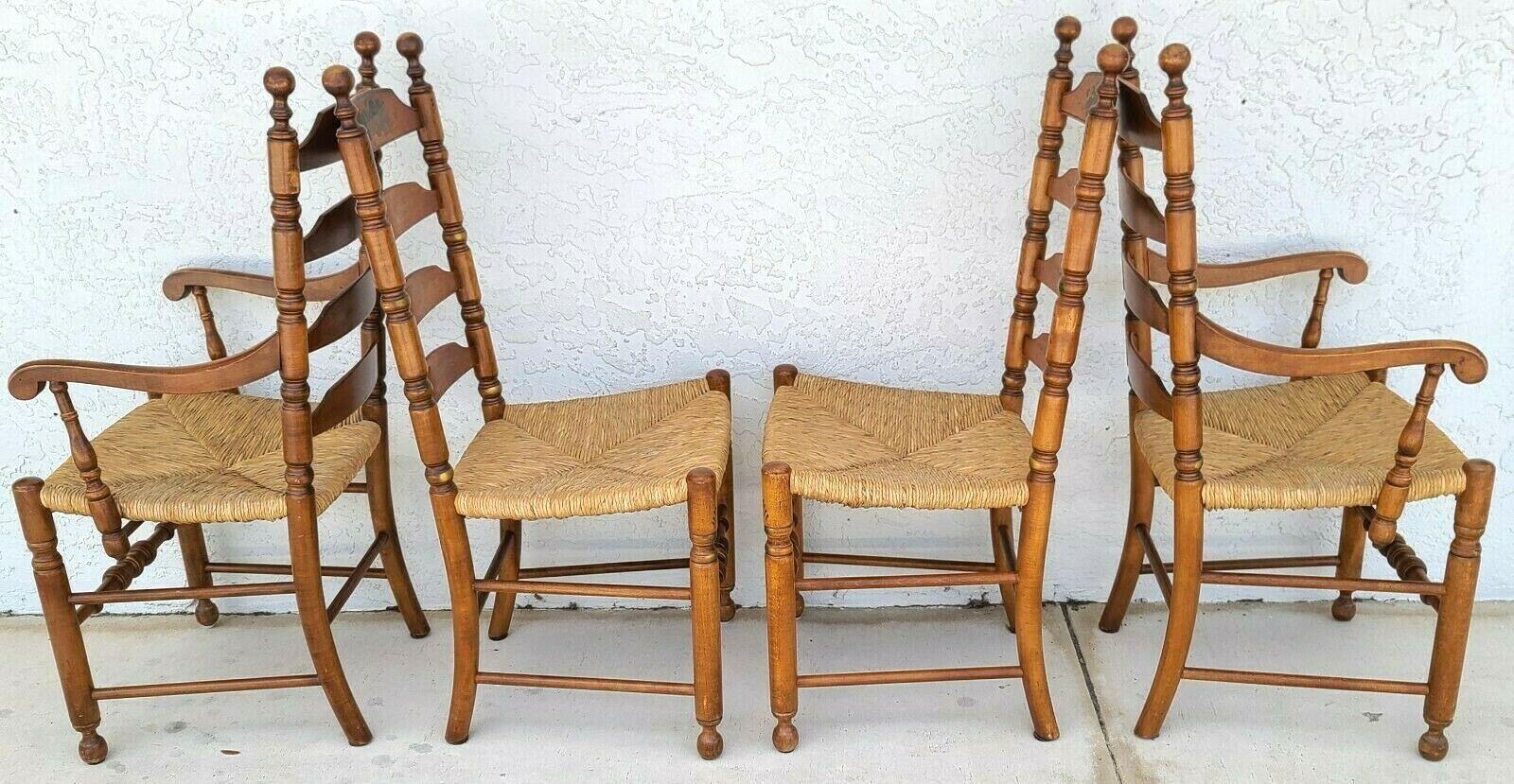 For FULL item description click on CONTINUE READING at the bottom of this page.

Offering One Of Our Recent Palm Beach Estate Fine Furniture Acquisitions Of A 
Set of 4 Vintage L Hitchcock Harvest Stenciled Ladder Back Rush Seat Dining Chairs
Set