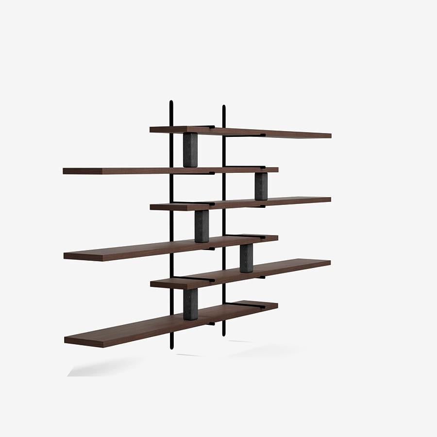This ladder street shelving by Yabu Pushelberg in mist matte lacquered oak is paired with Belgian bluestone accents.

The ladder street shelving unit by Yabu Pushelberg also rests on a foundation of solid stone in Carrara marble and/or Belgian