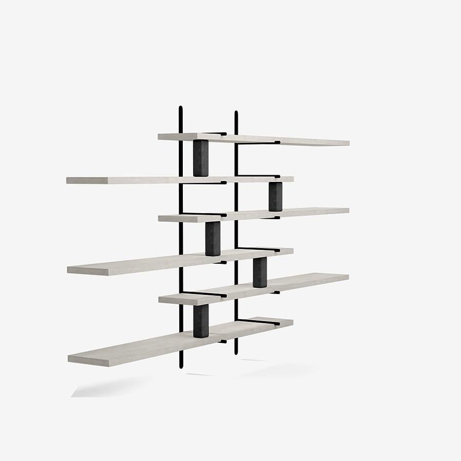 This ladder street shelving by Yabu Pushelberg in ivory ultra matte lacquered oak is paired with Belgian Bluestone accents.

The ladder street shelving unit by Yabu Pushelberg also rests on a foundation of solid stone in Carrara Marble and/or
