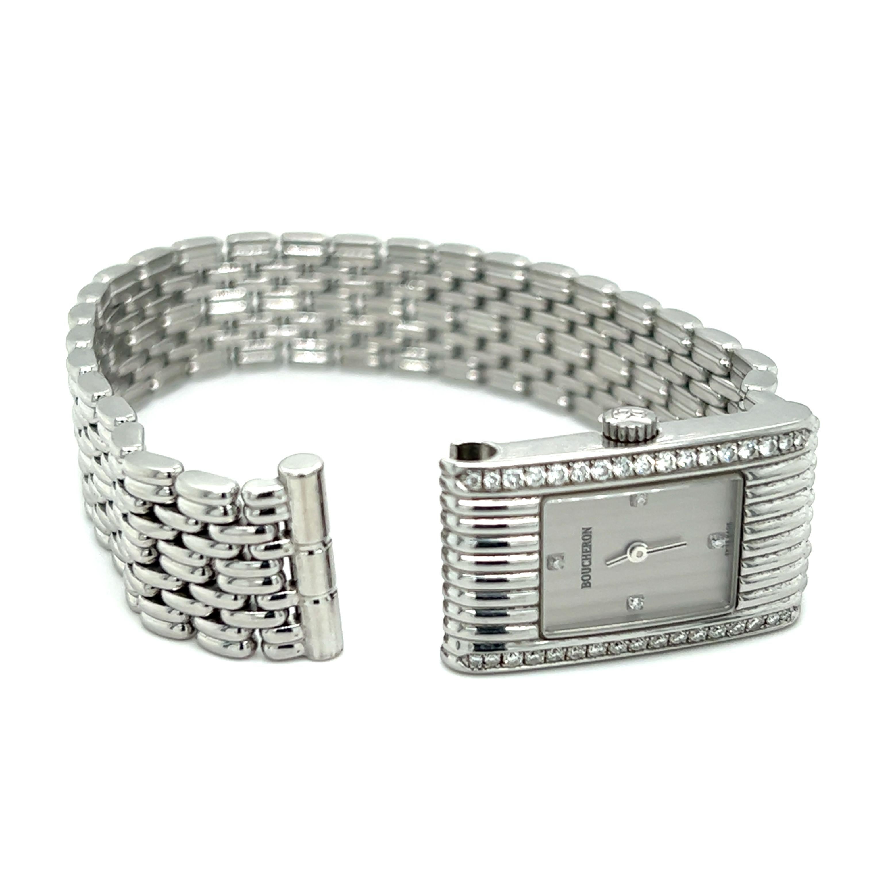  One woman's Swiss-made Stainless Steel quartz Boucheron Reflect watch set with thirty-eight round brilliant cut diamonds, approximately 0.50-carat total weight with matching G/H color and SI1 clarity. The stainless steel bracelet measures 25.00mm