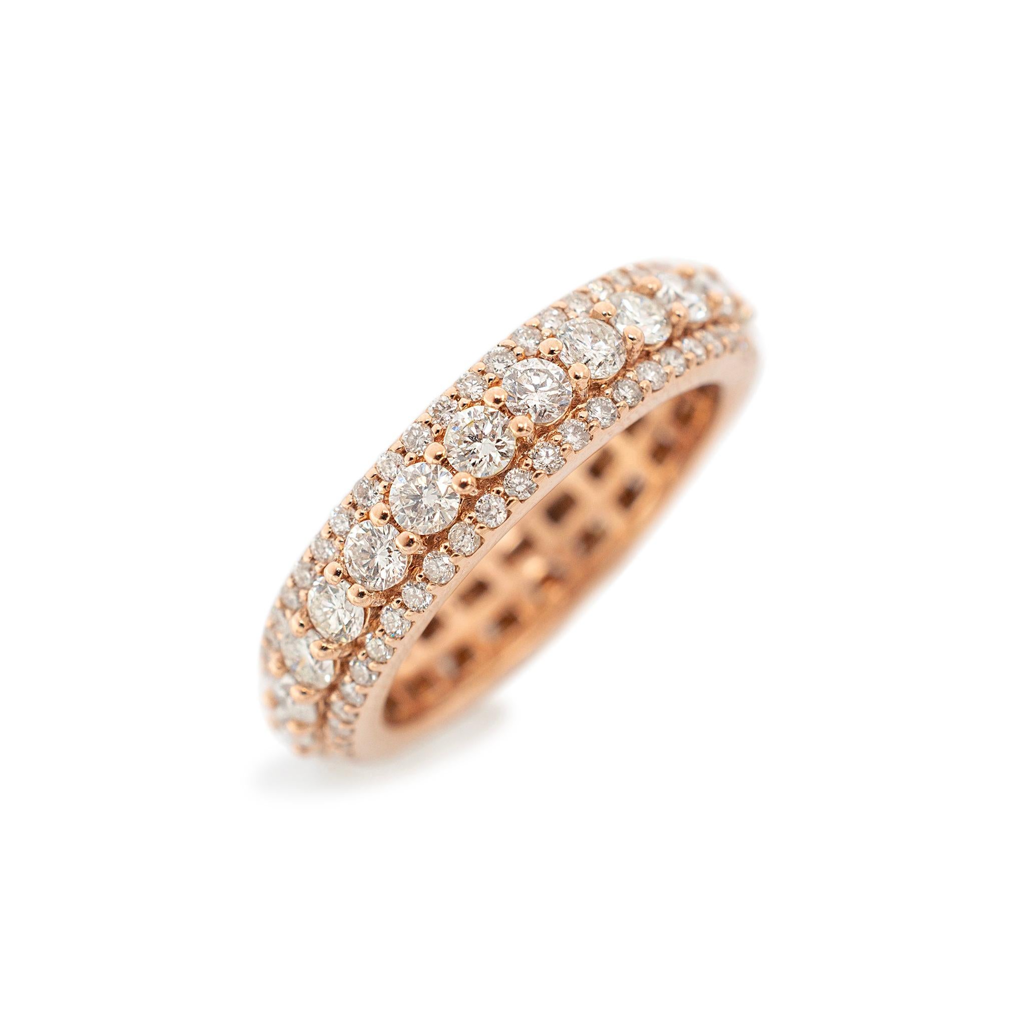 Gender: Ladies

Metal Type: 10K Rose Gold

Size: 10

Shank Maximum Width: 5.60 mm

Weight: 6.36 grams

Ladies 10K rose gold three-row diamond wedding eternity band with a half-round shank. Engraved with 