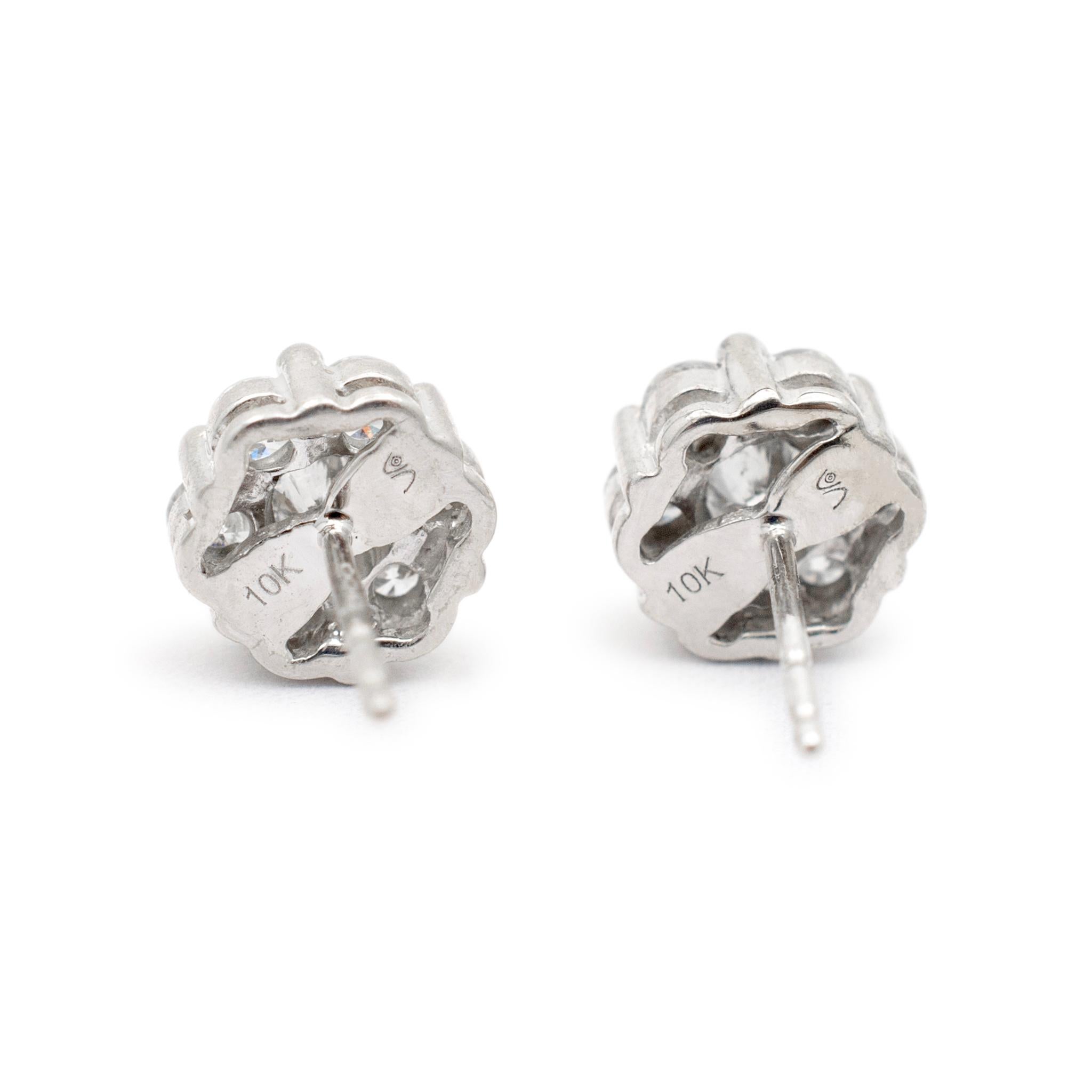 Gender: Ladies

Metal Type: 10K White Gold

Length: 0.50 Inches

Diameter: 7.50 mm

Weight: 2.06 grams

Ladies 10K white gold diamond stud earrings with push backs. Engraved with 
