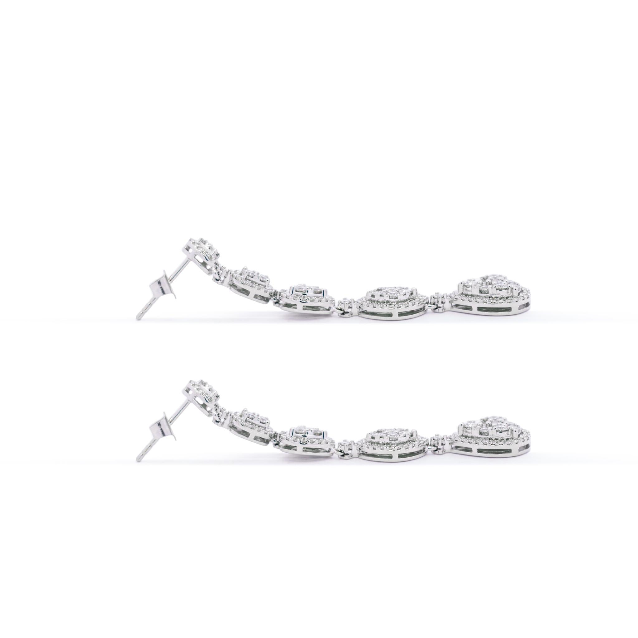 Ladies 10k White Gold Halo Diamond Cluster Drop Dangle Earrings In Excellent Condition For Sale In Houston, TX