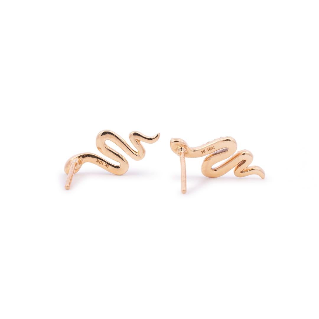 Gender: Ladies

Metal Type: 10K Yellow Gold

Length: 0.50 Inches

Width: 7.00mm 

Weight: 1.41 grams

Ladies 10K yellow gold diamond stud earrings with push backs. Engraved with 
